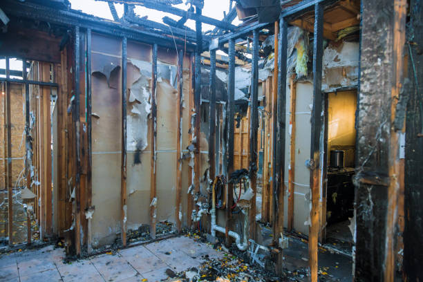 Professional Fire Damage Removal technician working in East Marion, NY